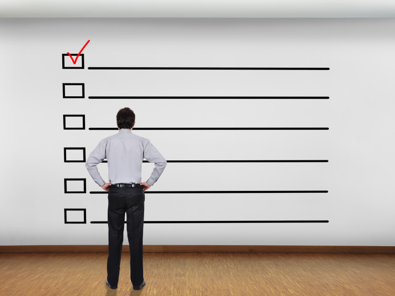 Illustration of a founder navigating the legal legal and financial checklist for closing startup