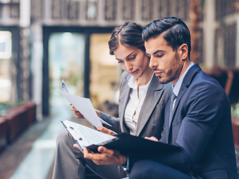 Entrepreneurs reviewing the term sheet