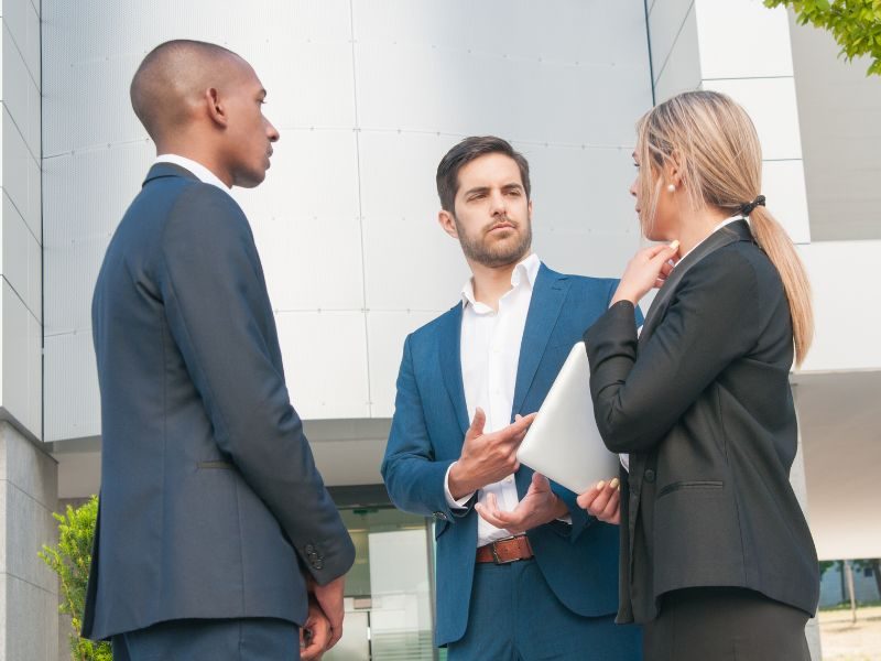 Outsourced accounting team engaged in discussion.