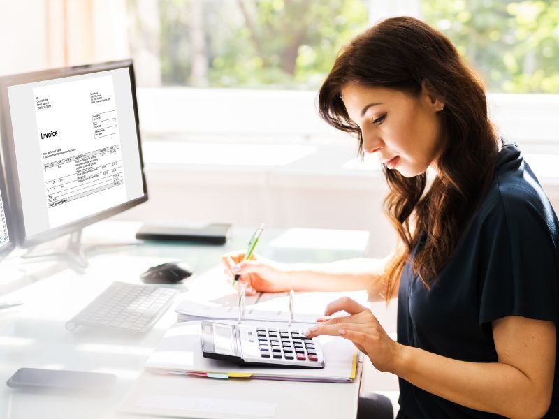 Finance team member analyzing company's accounts receivable and payable