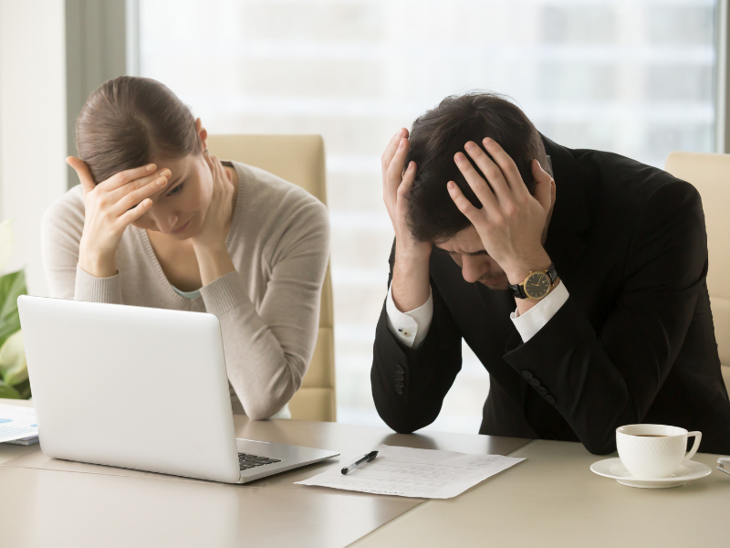 Worried entrepreneurs of a debt-ridden firm