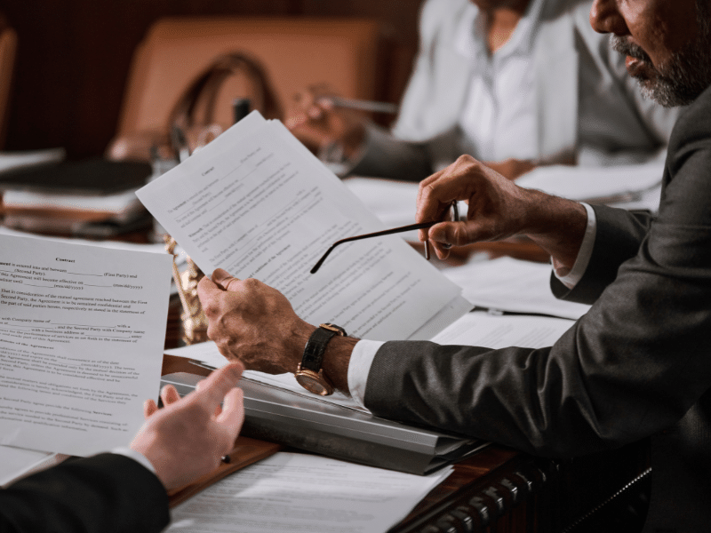Entrepreneur engaged in discussion during business closure